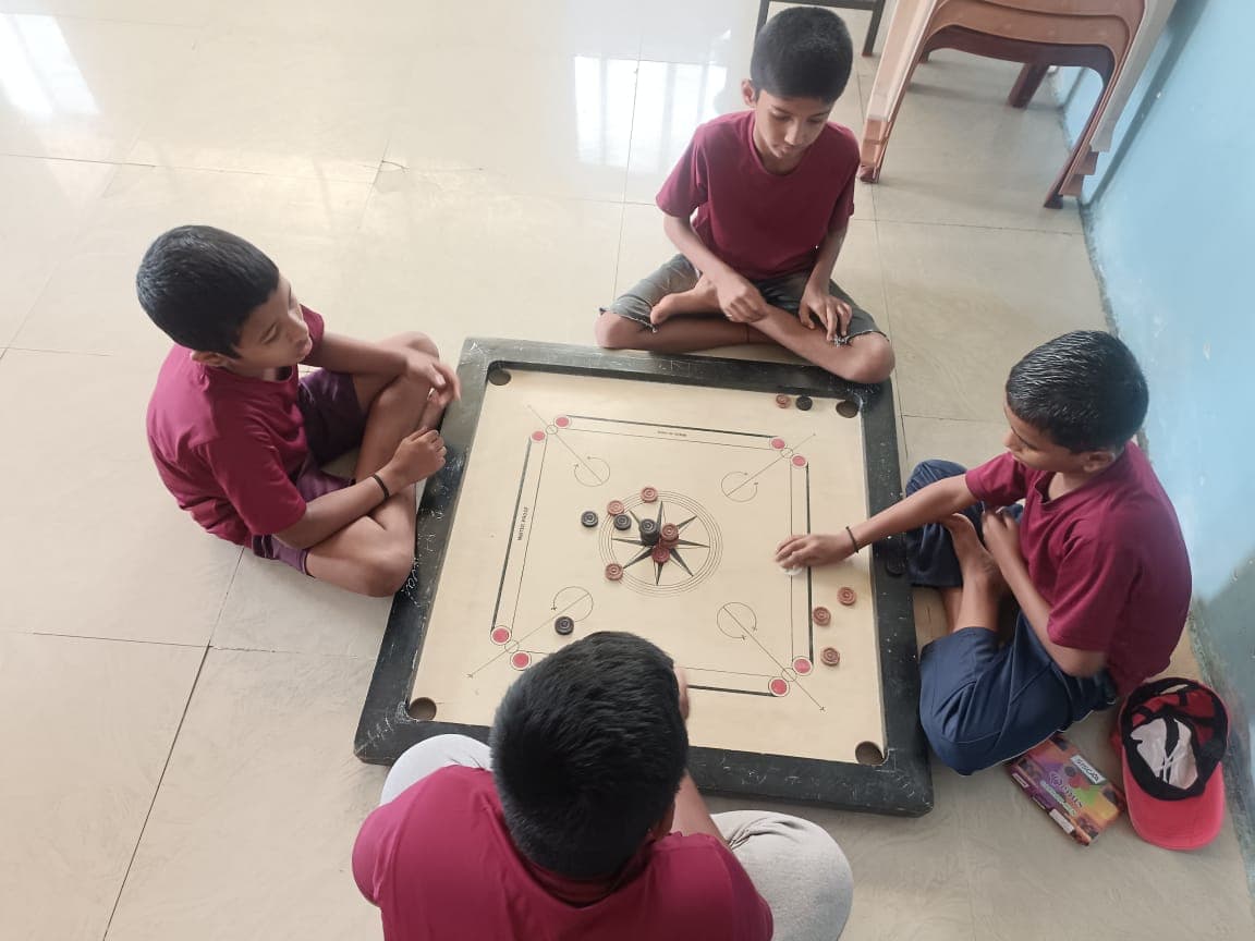 Activities: Courtyard Games & Carrom Tournaments
